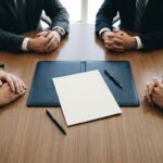 Legal teams discussing a Tennessee injury settlement